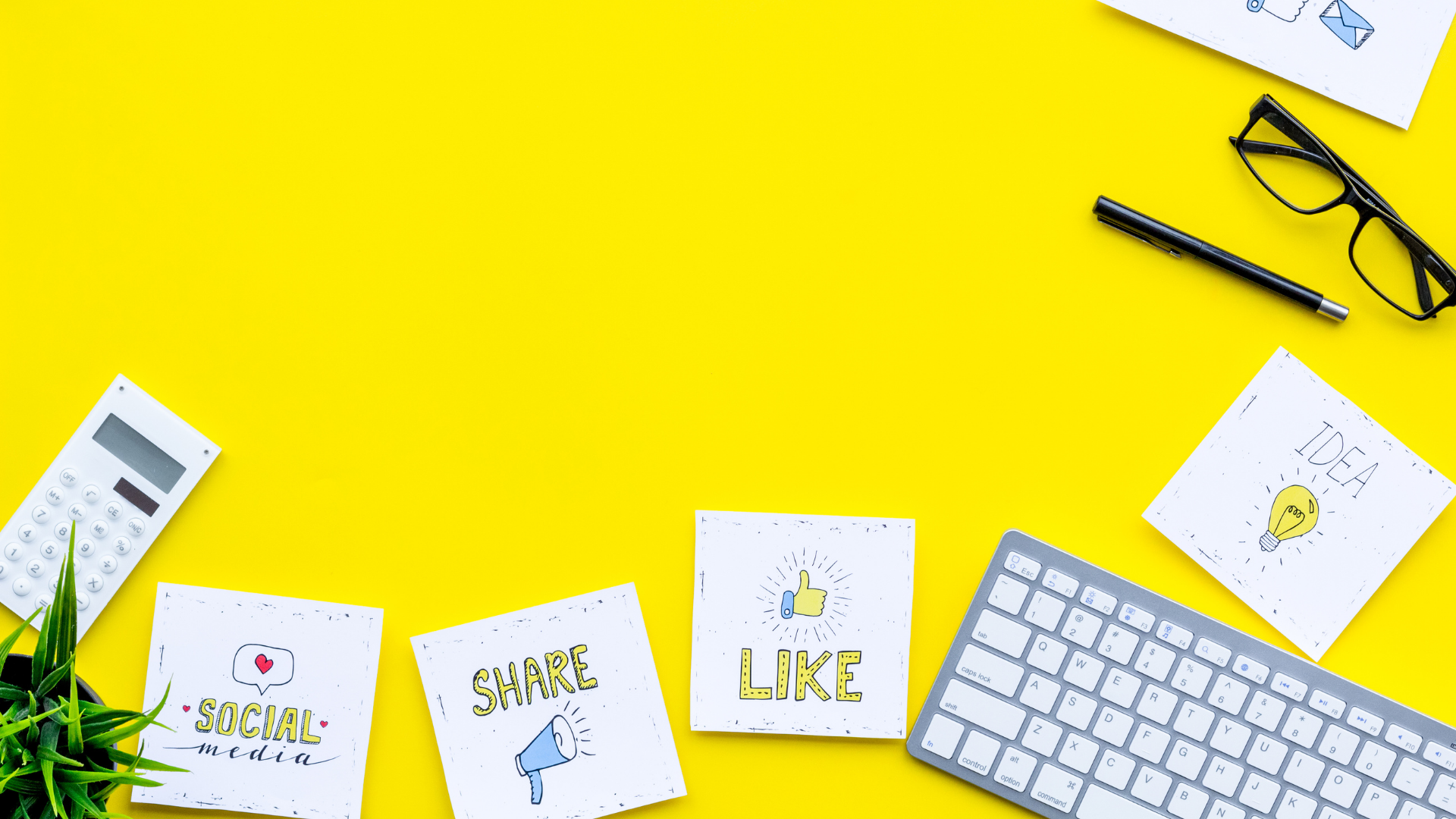 A yellow background with scattered notes saying' 'like, share', a keyboard and glasses.